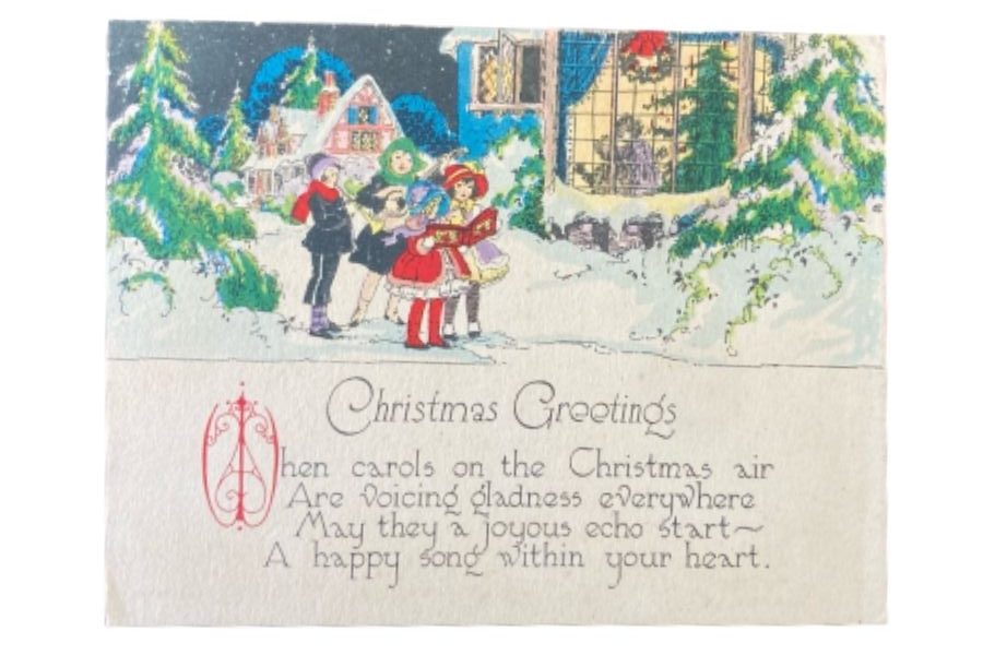 A colorful Christmas card featuring Christmas carolers outside a home.