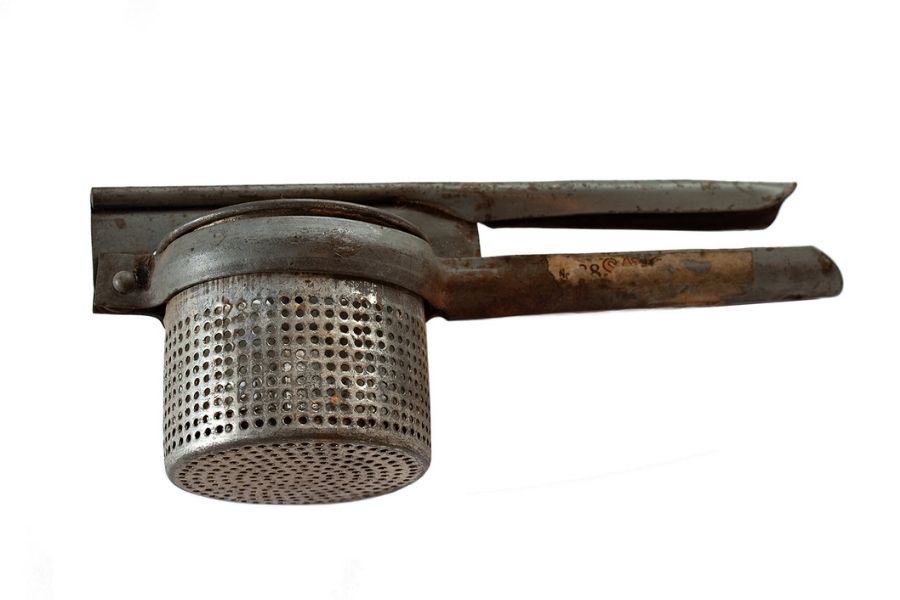 Metal press or potato ricer that Clara may have used in the kitchen at Körner's Folly. (Körner's Folly Collection)
